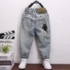 Spring 2025 Cool Children's Jeans Character Print Design New Arrival Kids' Denim Trousers for Boys